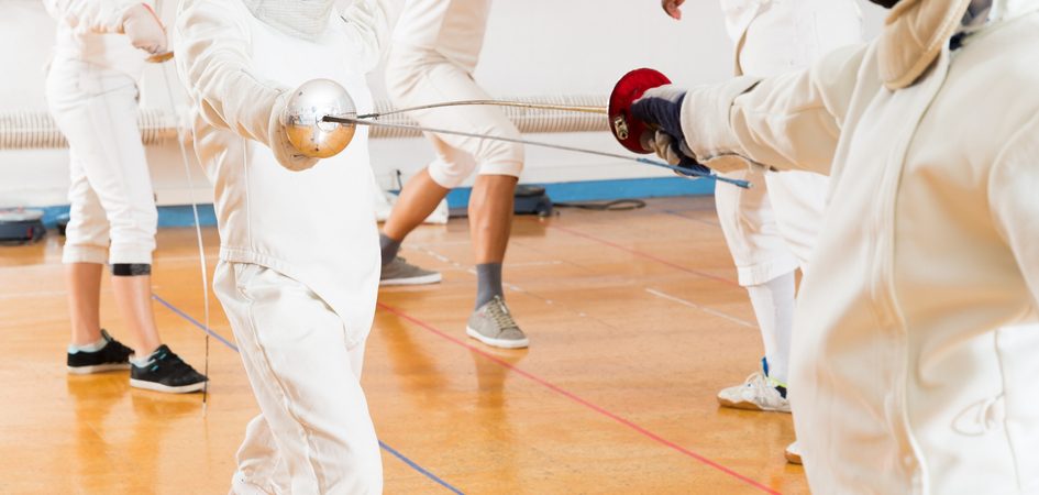 young fencers training with coach