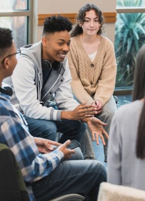 teens attend group therapy session