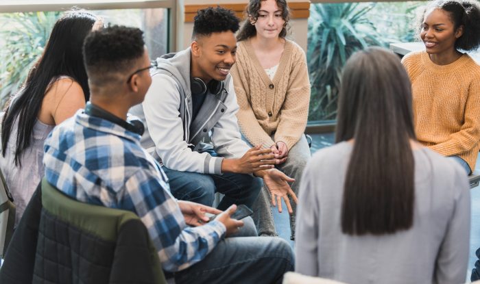 teens attend group therapy session