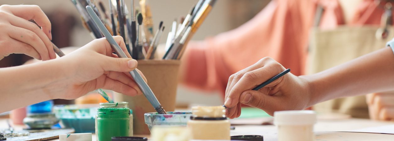 children using watercolor paints